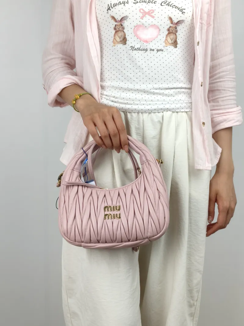 Miumiu Shoulder Bag Wander Matelassé Hobo Pink Lambskin Small 20 × 6 × 17 cm — on-model view 1 of 3