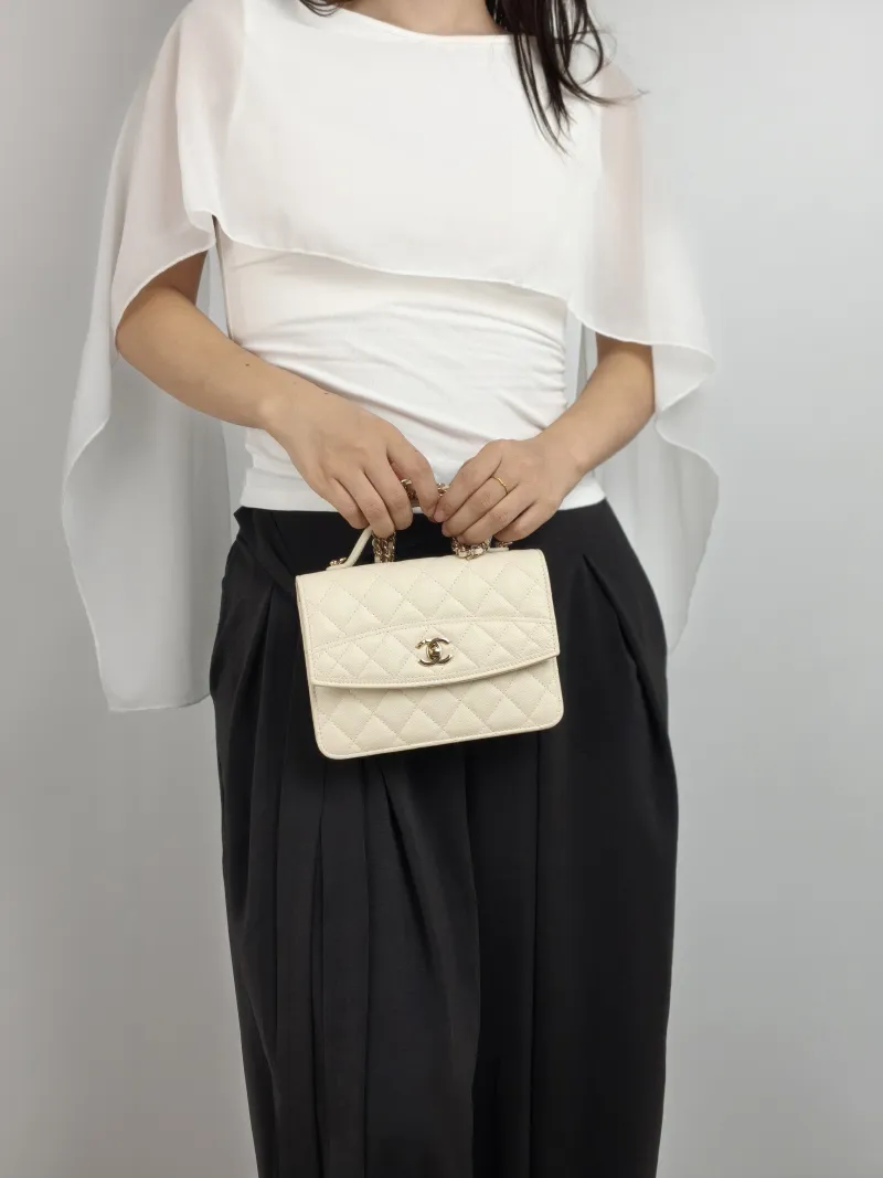 Chanel Backpack Backpack White Grained Calfskin One Size 18.2 × 5 × 14 cm — on-model view 1 of 2