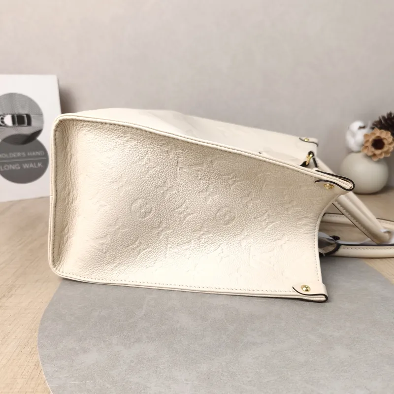 Louis Vuitton Shoulder Bag Onthego Medium White Monogram Empreinte Embossed Calfskin Medium 35 × 14 × 27 cm — detail view 3 of 12