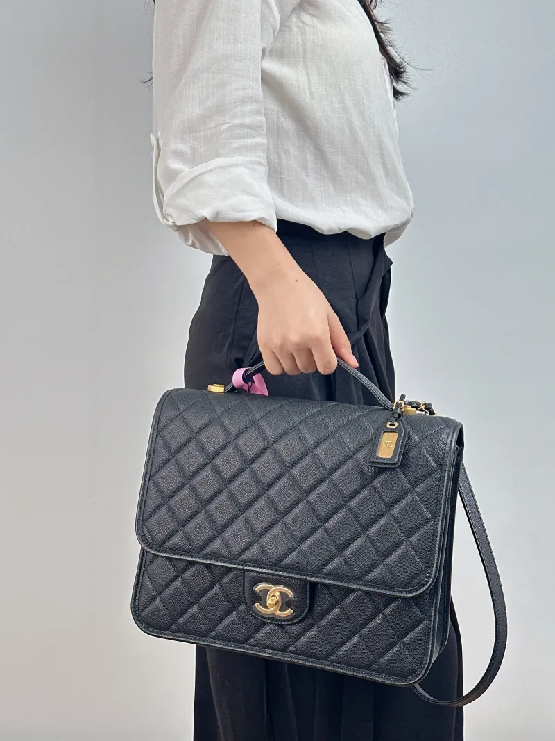 Chanel Backpack Backpack Black with Gold-Tone Hardware Grained Calfskin One Size 31 × 10 × 25 cm — on-model view 1 of 2