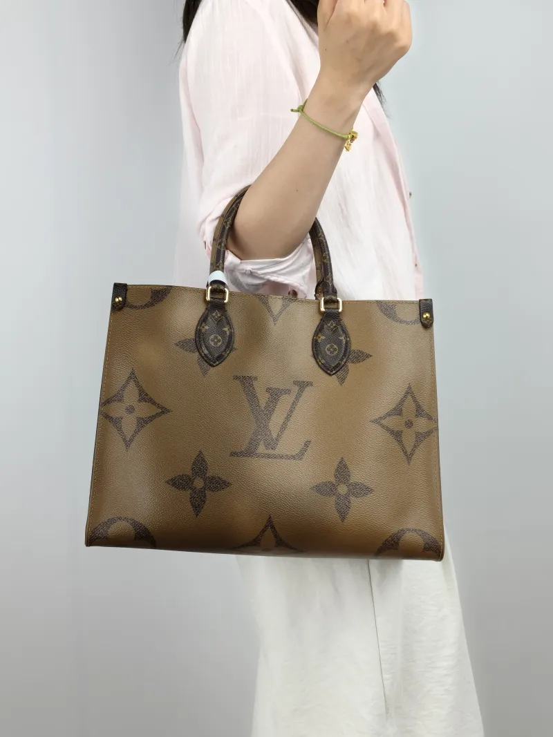 Louis Vuitton Shoulder Bag Onthego Medium Monogram PVC Medium 35 × 14 × 27 cm — on-model view 3 of 3