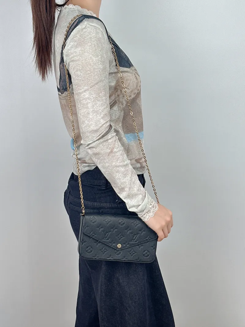 Louis Vuitton Crossbody Bag Pochette Félicie Black Calfskin Small21 × 3 × 12 cm — on-model view 1 of 2