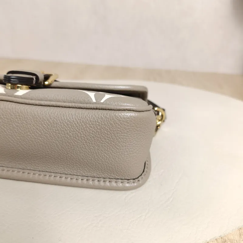 Louis Vuitton Crossbody Bag Diane Baguette Bag Empreinte Embossed Calfskin Monogramnano19 × 6 × 10.5 cm — detail view 10 of 13