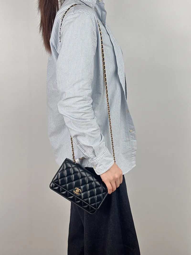 Chanel Crossbody Bag woc Black Lambskin Mini 19.2 × 3.5 × 12.3 cm — on-model view 3 of 3