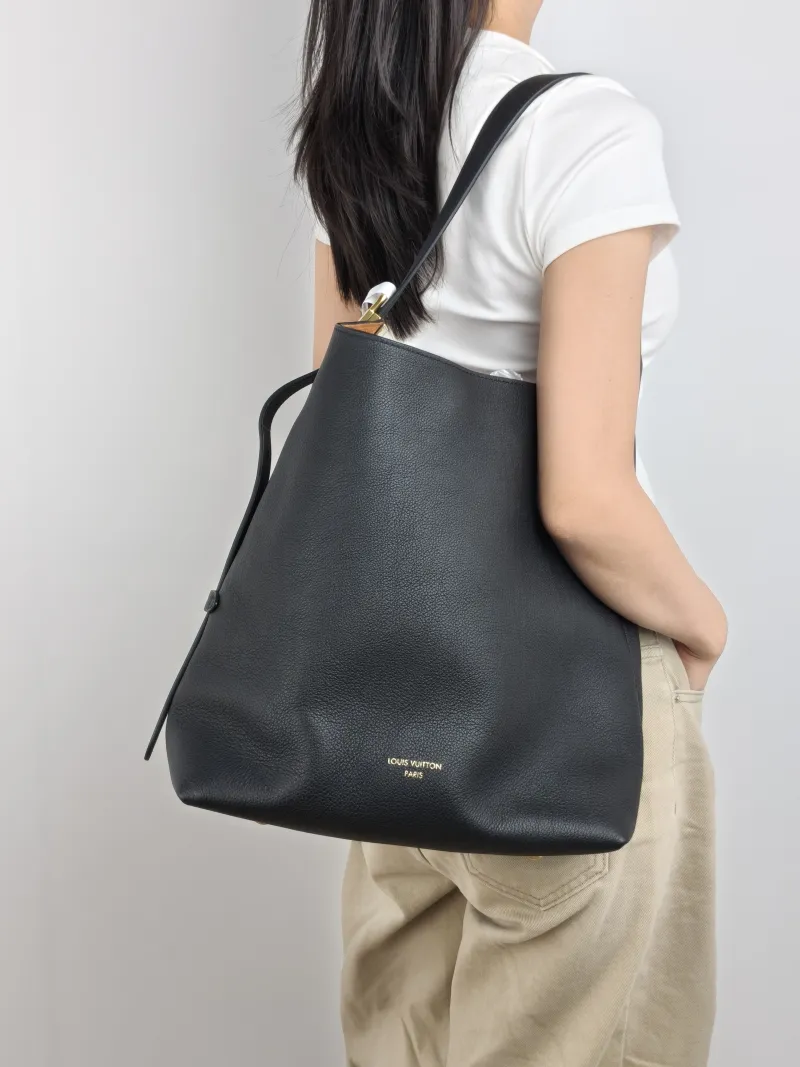 Louis Vuitton Shoulder Bag Low Key Hobo Shoulder Bag Black Calfskin Medium 31 × 18 × 35 cm — on-model view 2 of 2