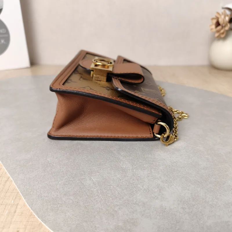 Louis Vuitton Crossbody Bag Dauphine Woc Woc Monogram PVC Mini 18.5 × 5 × 12 cm — detail view 1 of 11