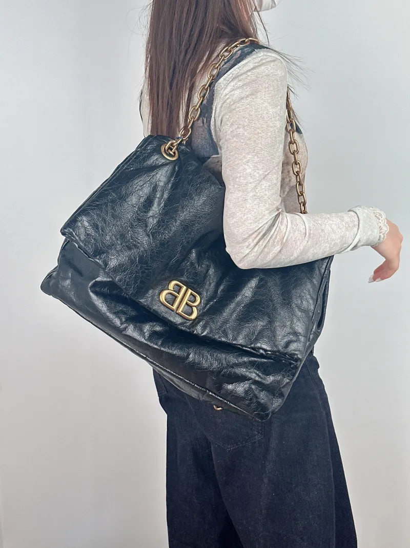 BALENCIAGA Shoulder Bag MONACO Chain Bag Black Calfskin Large43 × 15 × 33 cm — on-model view 2 of 2