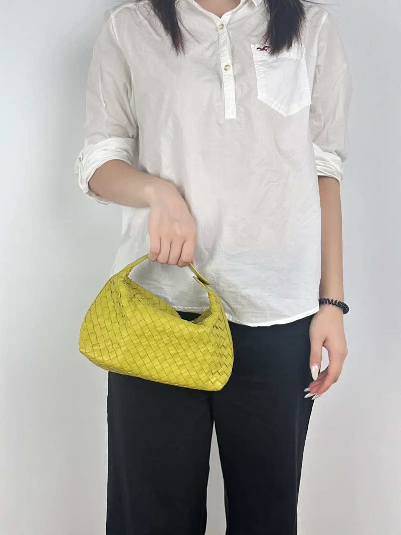 Bottega Veneta Top Handle Bag Wallace Woven Vanity Case Bag Green Calfskin Medium20 × 9.5 × 13 cm — on-model view 2 of 2