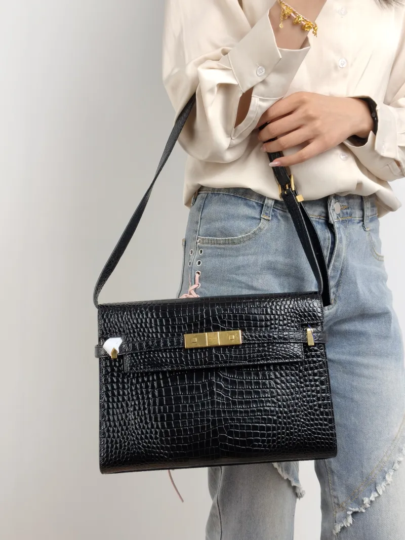 SAINT LAURENT Shoulder Bag MANHATTAN Black Calfskin Medium 29 × 7.5 × 20 cm — on-model view 1 of 2