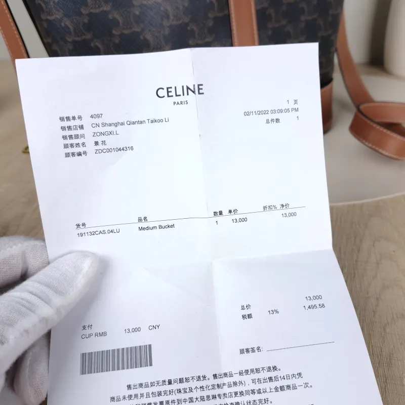 CELINE Crossbody Bag Triomphe Bucket Bag Monogram PVC Medium 24 × 18 × 27 cm — detail view 1 of 10