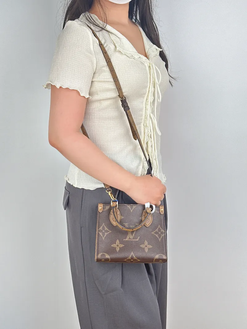 Louis Vuitton Crossbody Bag Onthego BB Monogram PVCBB18 × 8.5 × 15 cm — on-model view 1 of 3