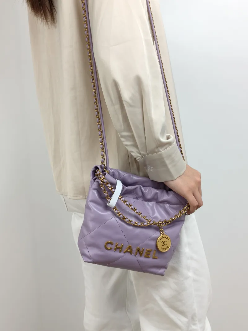Chanel Crossbody Bag 22Bag Calfskin Mini 20 × 6 × 19 cm — on-model view 1 of 3