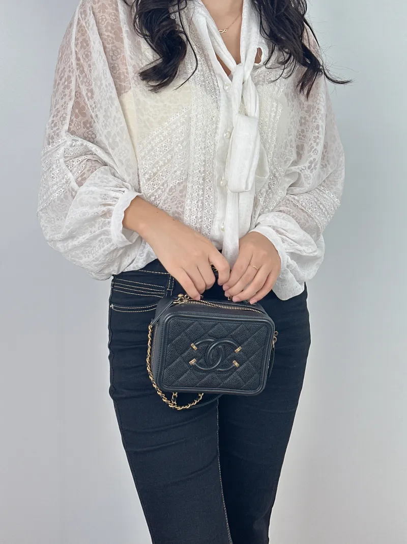 Chanel Crossbody Bag CC Filigree Vanity Cosmetic Bag Black Grained Calfskin Small 16 × 7 × 12 cm 26 — on-model view 2 of 2