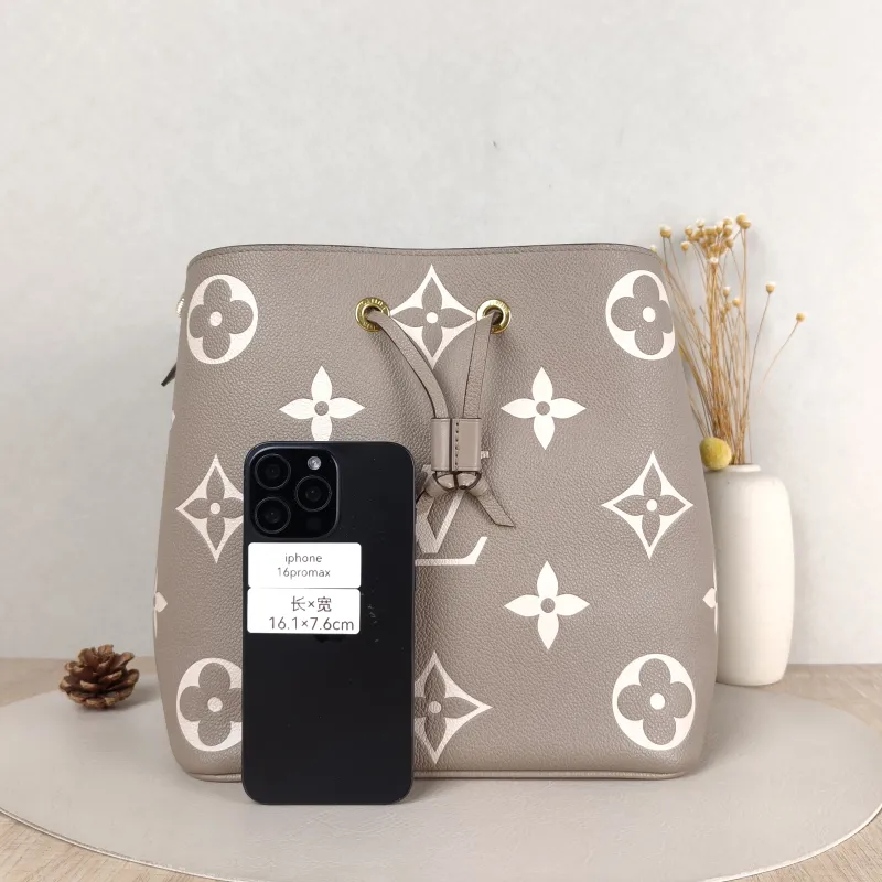 Louis Vuitton Shoulder Bag NÉONOÉ Bucket Bag · White Monogram Empreinte Embossed Calfskin Medium 26 × 17.5 × 26 cm — cover view 2 of 5