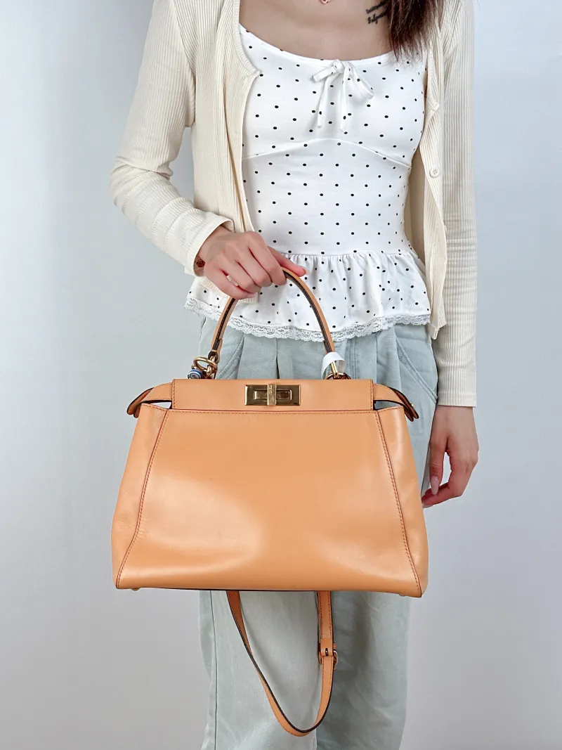 FENDI Top Handle Bag Peekaboo Brown Calfskin Medium 33.5 × 13 × 25.5 cm — on-model view 2 of 2