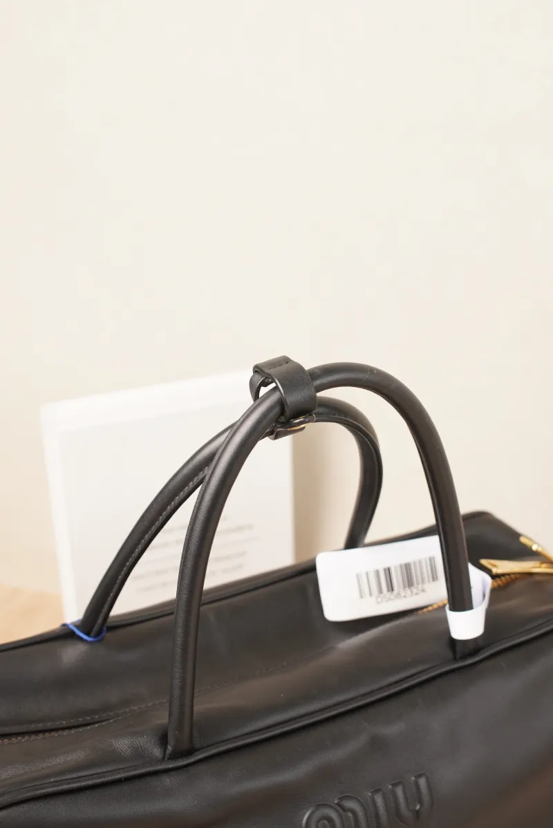 Miumiu Beau Bowling Bag Large Black Calfskin · 34 × 10 × 23 cm — detail view 10 of 16