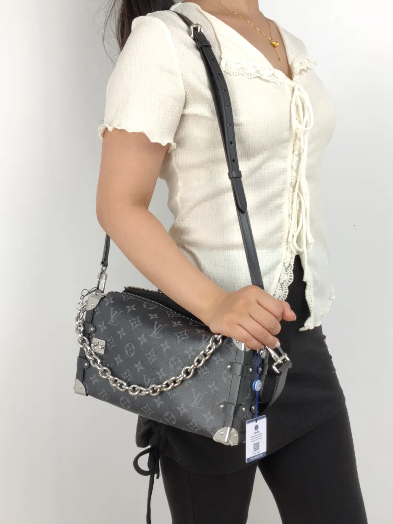 Louis Vuitton Crossbody Bag Side Trunk East West Box Monogram PVC Medium 28 × 7 × 15 cm — on-model view 2 of 3