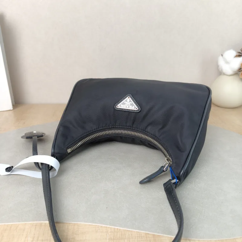 PRADA Shoulder Bag Re-Edition 2005 Hobo Black Nylon Mini 22 × 6.5 × 18 cm — detail view 1 of 10