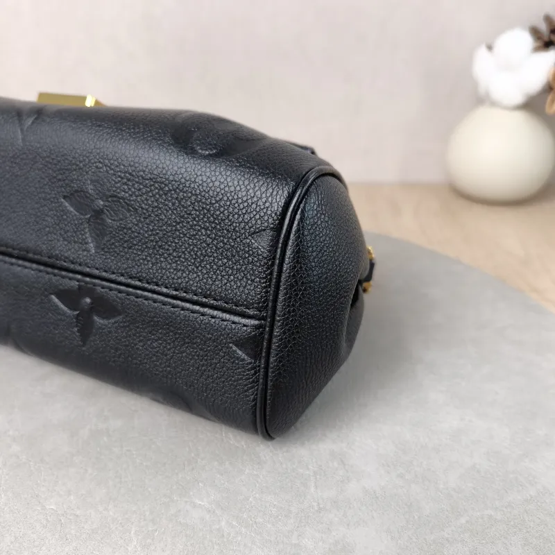 Louis Vuitton Crossbody Bag Favorite Black Monogram Empreinte Embossed Calfskin Medium 24 × 9 × 14 cm — detail view 2 of 12