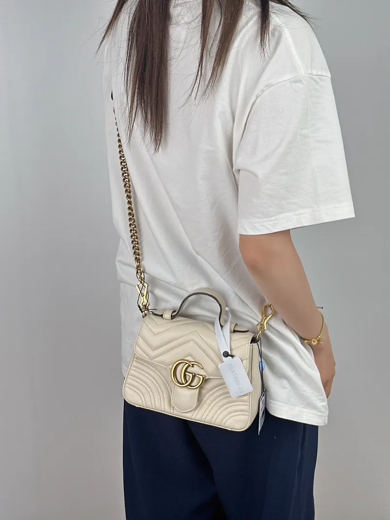 GUCCI Crossbody Bag GG Marmont Marmont White Calfskinmini21 × 8 × 15.5 cm — on-model view 1 of 2