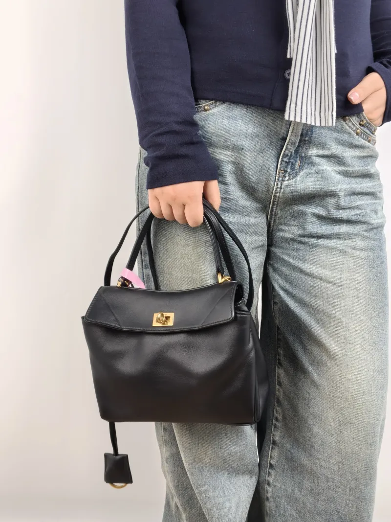 BALENCIAGA Crossbody Bag RODEO Black CC alfskin Mini 23 × 10 × 17 cm — on-model view 2 of 2