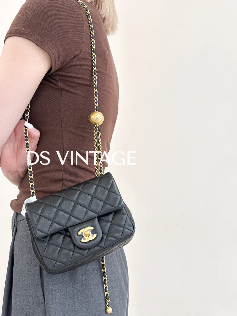 Chanel Crossbody Bag Classic Flap Mini CF Mini Black with Gold-Tone Hardware SL ambskin Mini 17 × 8 × 13.5 cm — on-model view 1 of 3