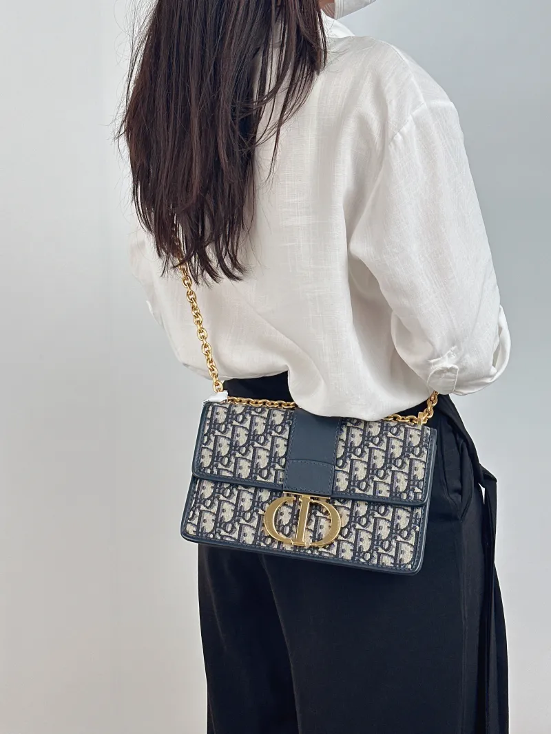 DIOR Crossbody Bag 30Montaigne 30 Edition Canvas Medium 25 × 9 × 16.5 cm — on-model view 1 of 2