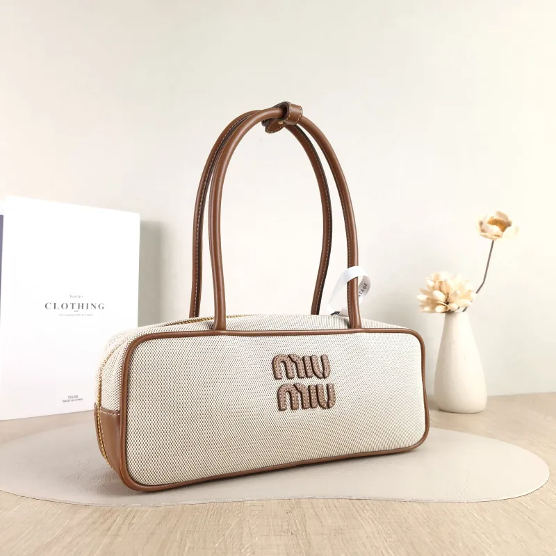 Miumiu Top Handle Bag Beau Brown Canvas · Calfskin 28 × 8 × 11.5 cm — cover view 3 of 5