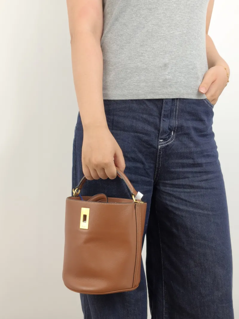 CELINE Crossbody Bag Bucket 16 Bucket Bag Caramel Calfskin Small 16 × 16 × 18 cm — on-model view 2 of 3