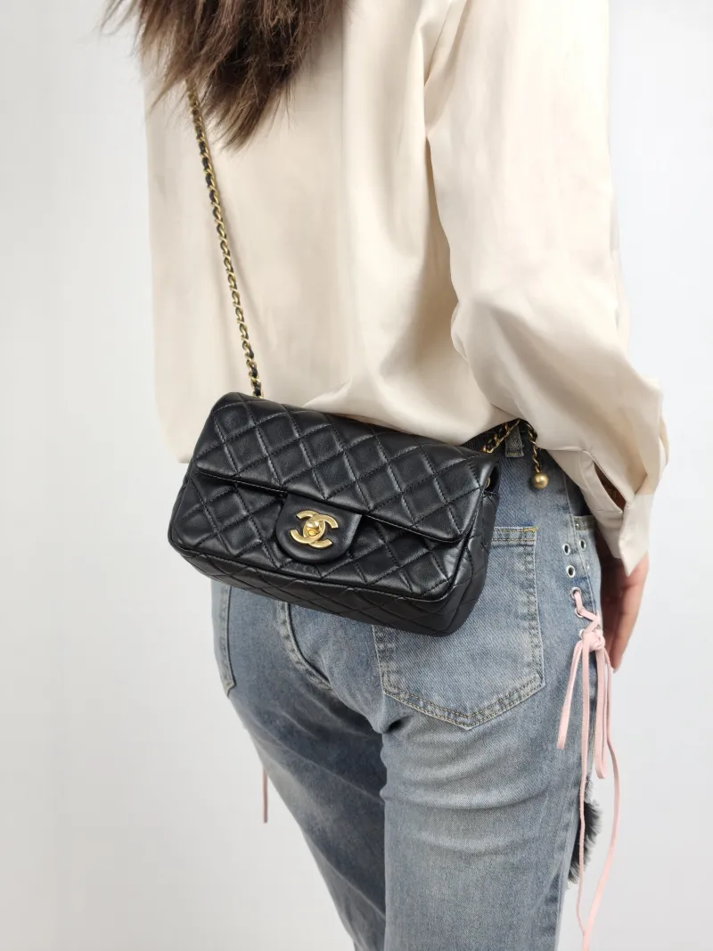 Chanel Crossbody Bag Classic Flap Large Mini CF Mini Black with Gold-Tone Hardware Lambskin mini 20 × 6 × 12 cm 29 — on-model view 2 of 2