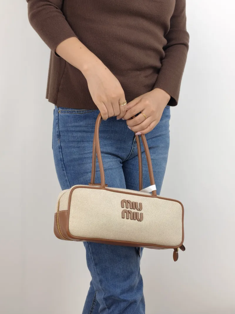 Miumiu Top Handle Bag Beau Brown Canvas · Calfskin 28 × 8 × 11.5 cm — on-model view 2 of 2