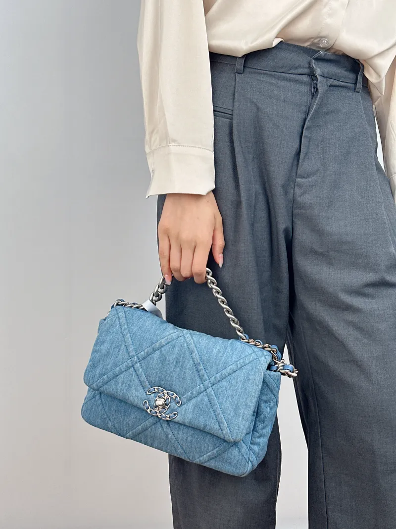 Chanel Crossbody Bag 19Bag Small 26 × 9 × 16 cm — on-model view 1 of 2