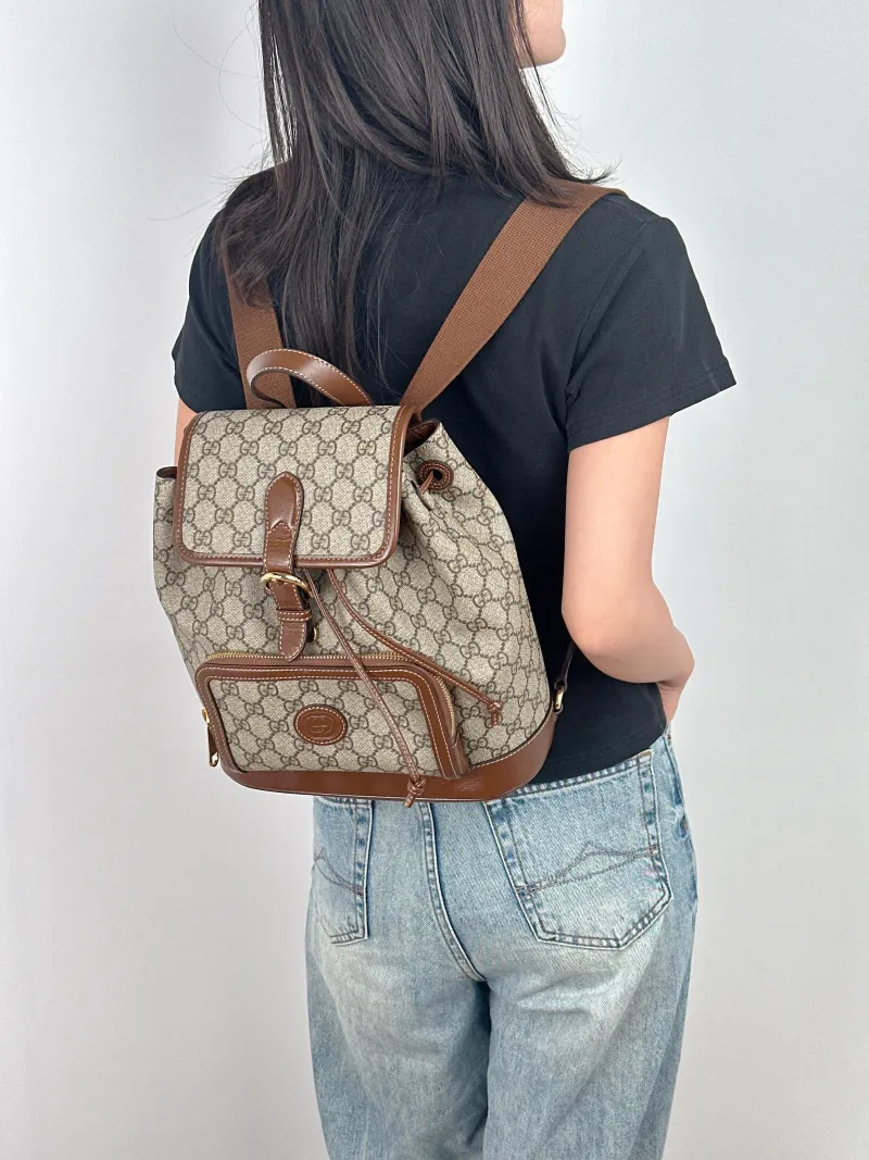 GUCCI Backpack GG Retro Collection Backpack Brown PVC One Size 26.5 × 13 × 30 cm — on-model view 2 of 3