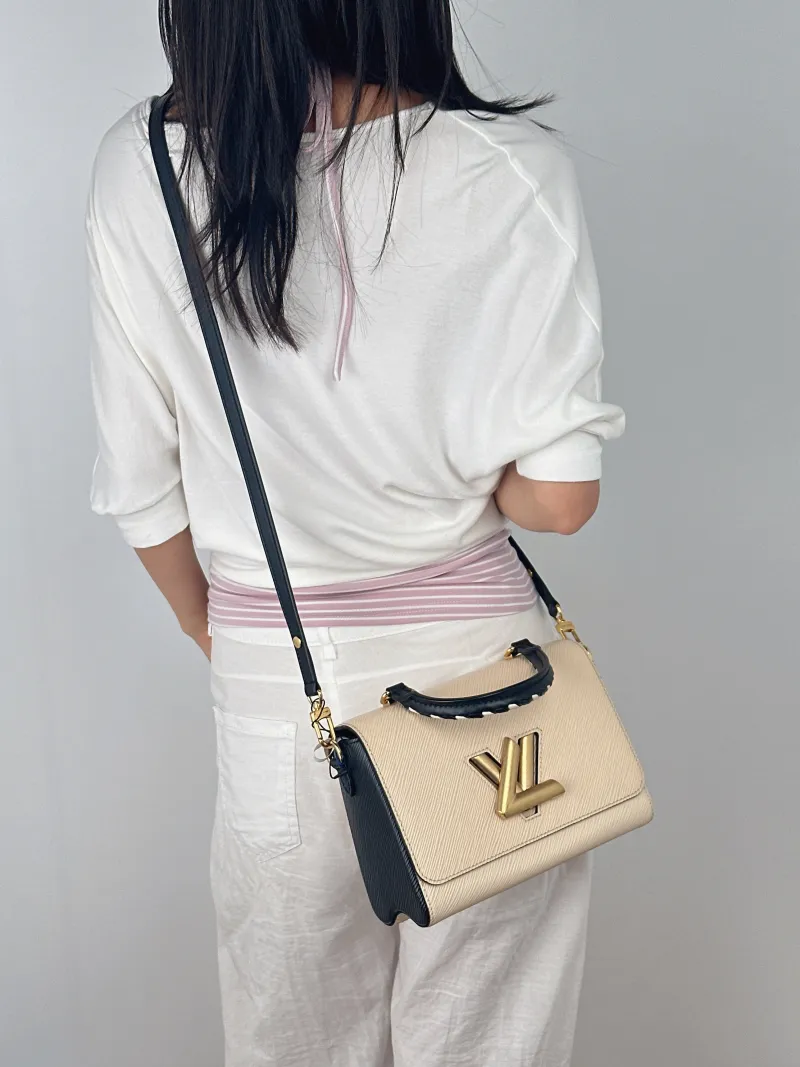 Louis Vuitton Crossbody Bag Twist Colorblock Epi Embossed Calfskin Medium23 × 9.5 × 17 cm — on-model view 2 of 3