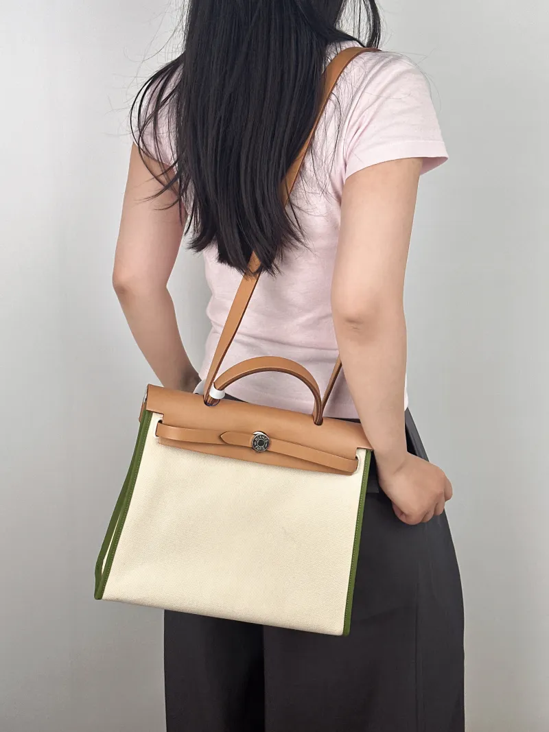Hermès Crossbody Bag Herbag 31Green White Canvas Medium30.5 × 11 × 25.5 cm — on-model view 2 of 2