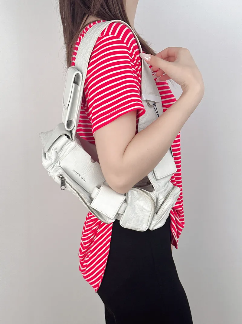 BALENCIAGA Top Handle Bag Superbusy Top Handle Bag White Lambskinmini 35 × 11 × 12 cm — on-model view 2 of 2