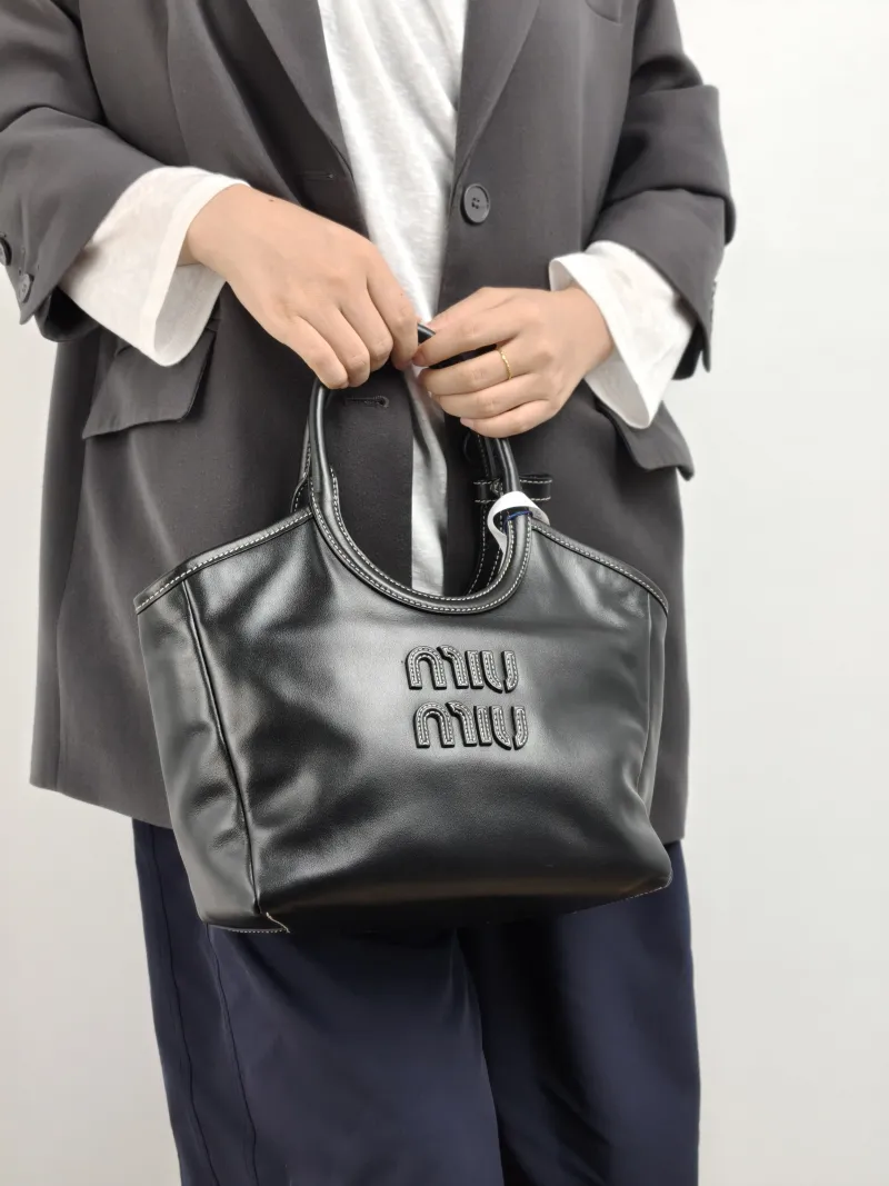 Miumiu Shoulder Bag IVY Tote Shopping Tote Black CC alfskin Small 22 × 12 × 23.5 cm — on-model view 2 of 2