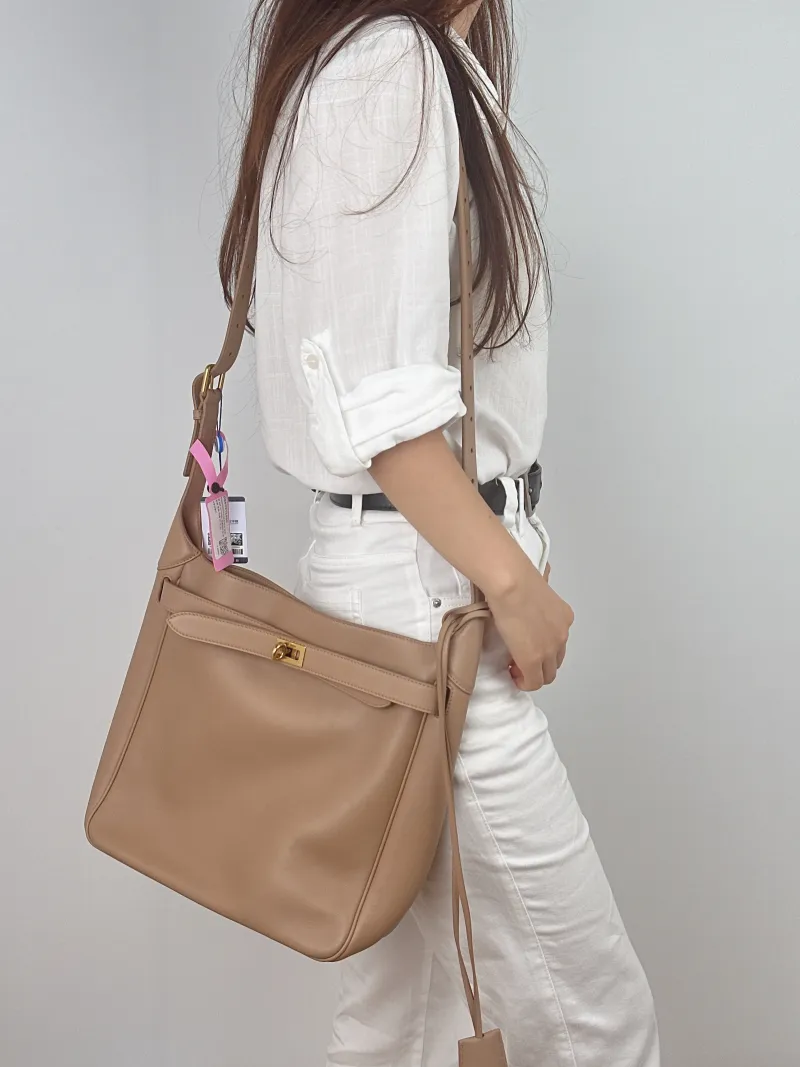 BALENCIAGA Crossbody Bag bel air hobo Shoulder Crossbody Bag Taupe Calfskin One Size 27 × 9 × 27 cm — on-model view 1 of 2