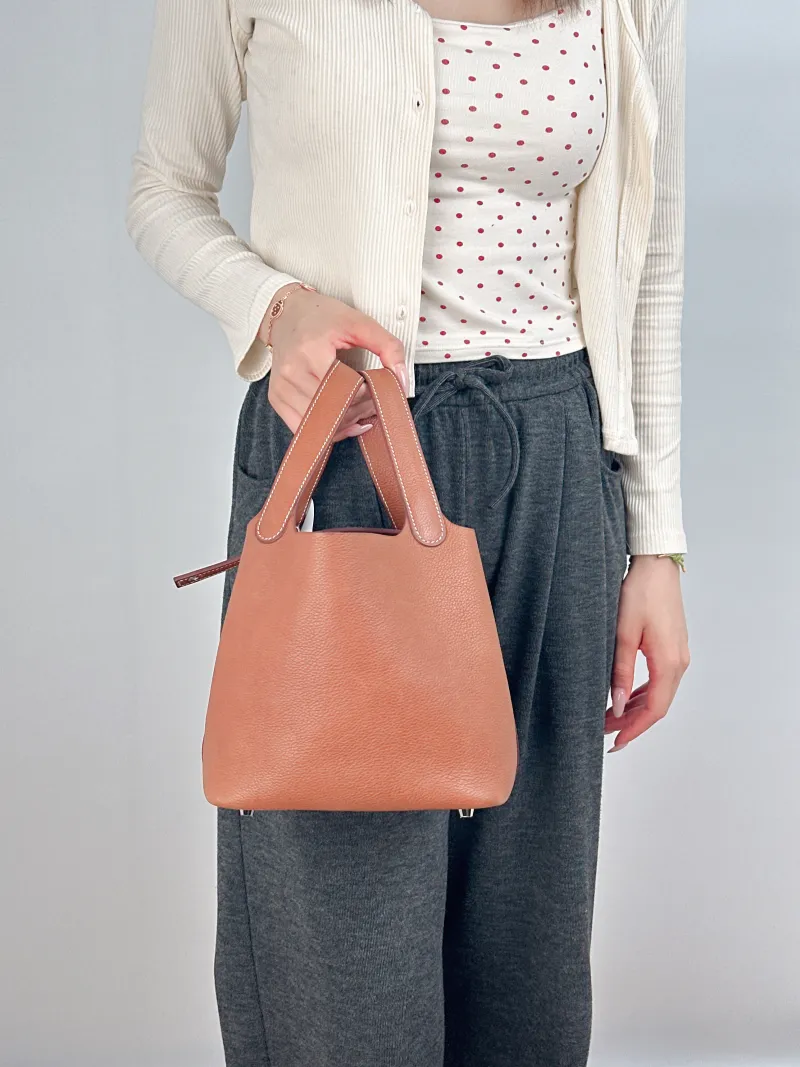 Hermès Top Handle Bag Picotin Lock 18 1834 Saddle Leather Small18 × 13 × 18 cm — on-model view 2 of 2