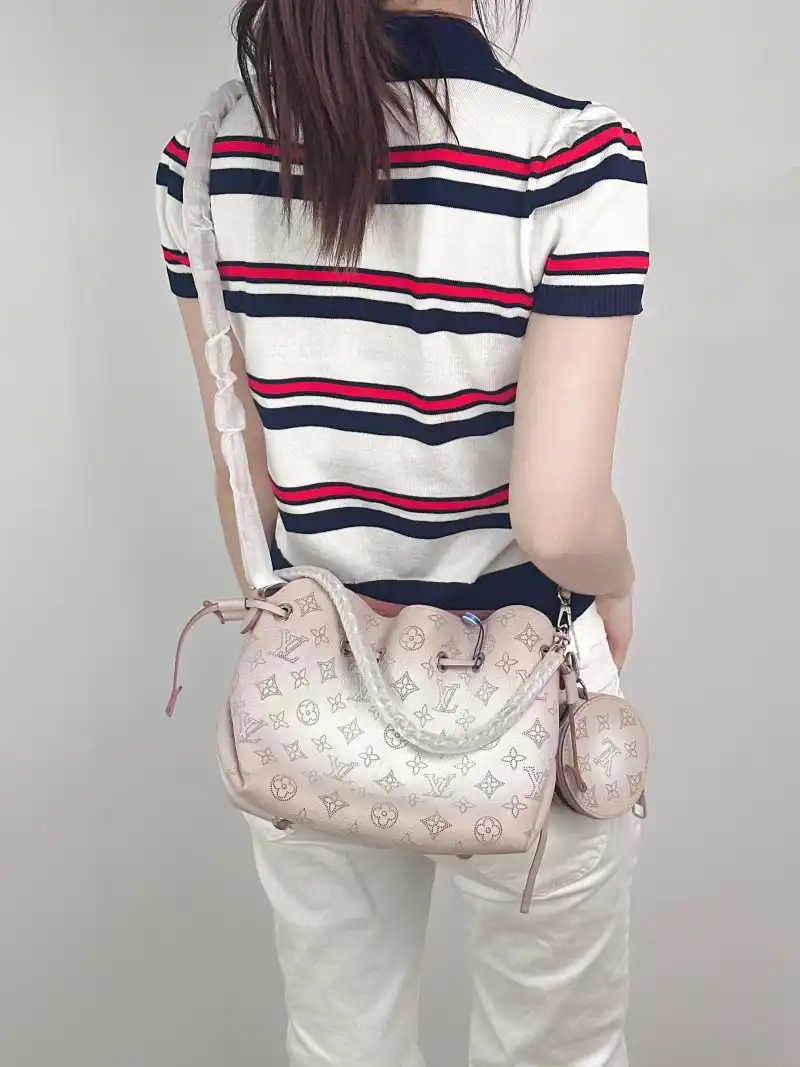 Louis Vuitton Crossbody Bag BELLA Calfskin One Size 22 × 14 × 19 cm — on-model view 2 of 3