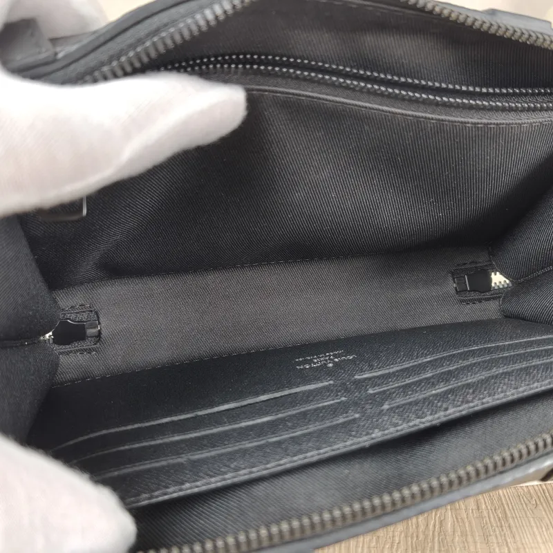 Louis Vuitton TRUNK WALLETHET Box Monogrampvc · Microchip Edition · Shoulder Strap Dust Bag · 22.5 × 5 × 14 cm — on-model view 6 of 10
