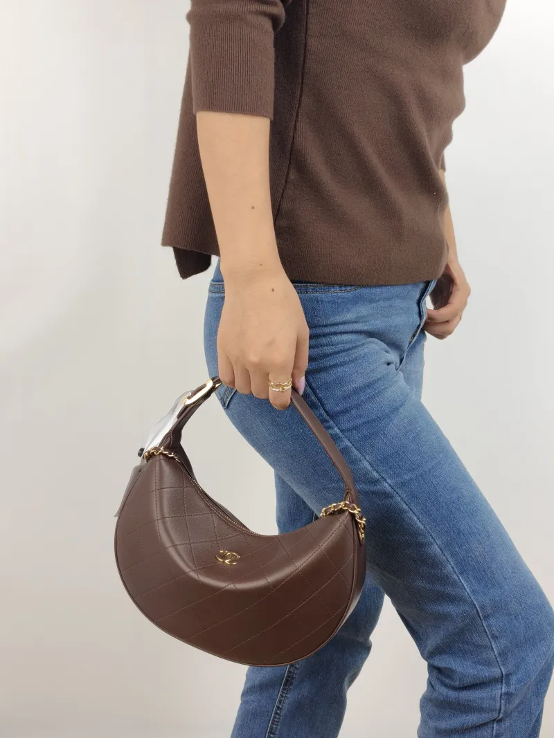 Chanel Shoulder Bag hobo Lambskin One Size 23.5 × 6 × 15 cm — on-model view 1 of 2