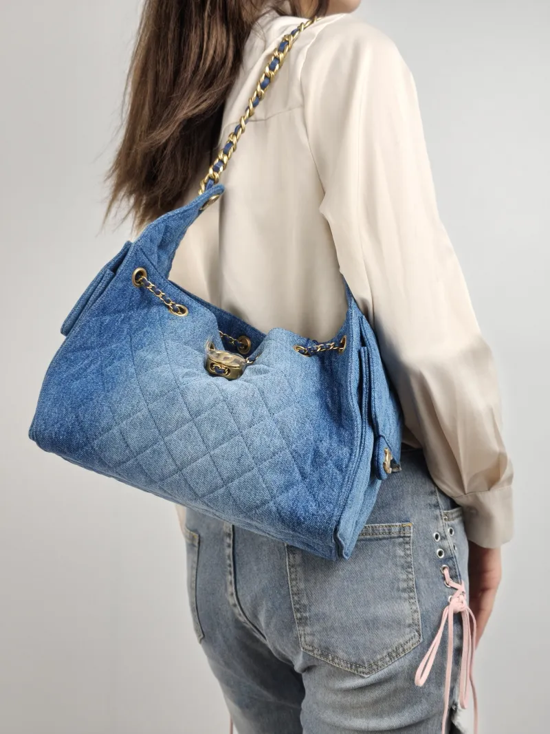 Chanel Shoulder Bag 25Bag Blue Small 26 × 14 × 30 cm — on-model view 1 of 2