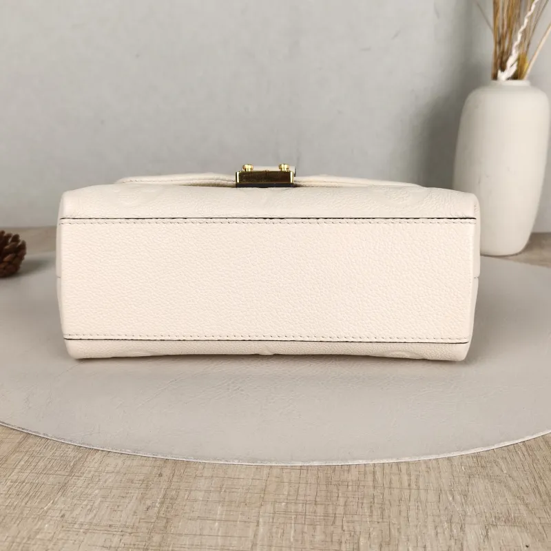 Louis Vuitton Crossbody Bag MADELEINE White Monogram Empreinte Embossed Calfskin BB 24 × 8.5 × 17 cm — cover view 4 of 5