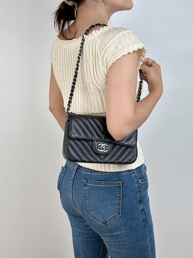 Chanel Crossbody Bag Classic Flap Large Mini CF Mini Black V Grained Calfskin mini20 × 6 × 12 cm — on-model view 1 of 2