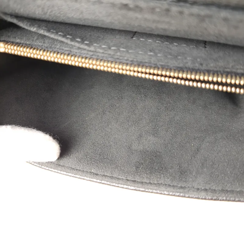 Louis Vuitton Crossbody Bag MADELEINE Black Empreinte Embossed Calfskin BB 24 × 8.5 × 17 cm — detail view 1 of 12