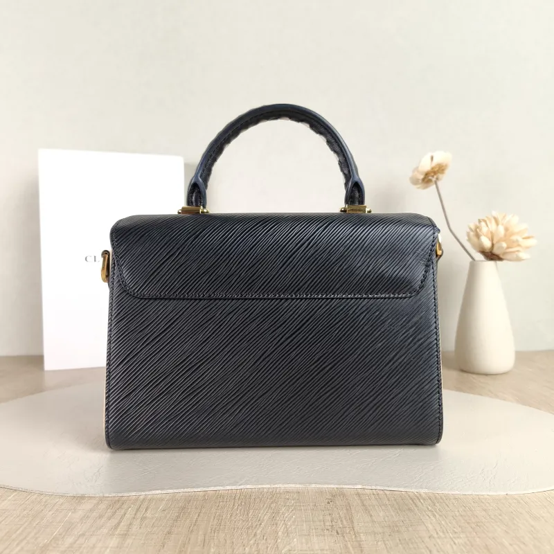 Louis Vuitton Crossbody Bag Crafty Twist Black · White Epi Embossed Calfskin Medium 23 × 9.5 × 17 cm — cover view 3 of 5