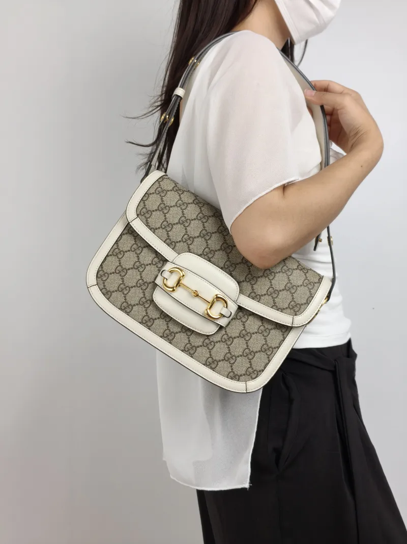 GUCCI Crossbody Bag Horsebit 1955 Horsebit Medium White Monogram PVC Medium 25 × 8 × 18 cm — on-model view 2 of 2