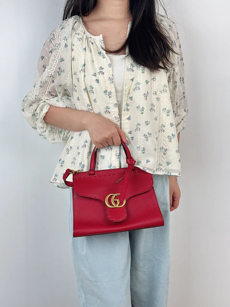 GUCCI Top Handle Bag Marmont Top Handle Bag Red Calfskin One Size26 × 11 × 18 cm — on-model view 2 of 3