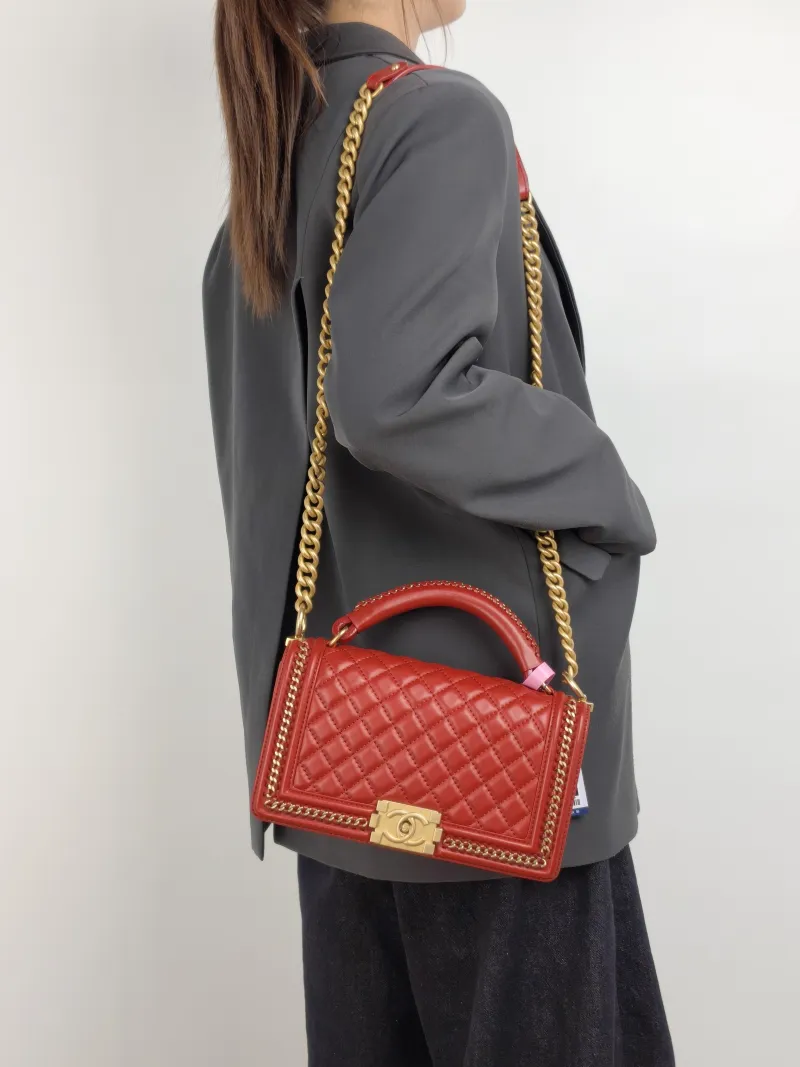 Chanel Crossbody Bag Le Boy​ Red Lambskin Medium 25 × 9 × 15 cm 24 — on-model view 2 of 3
